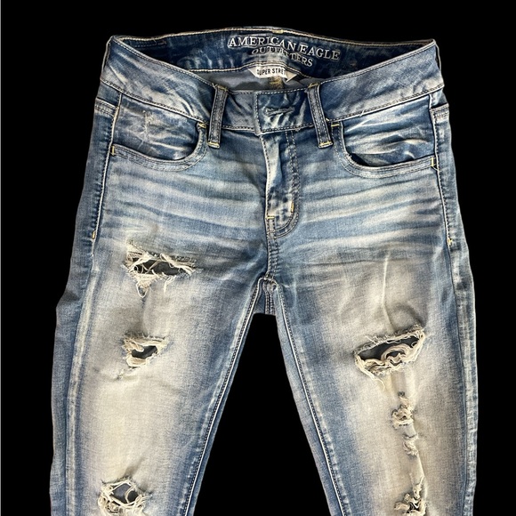 American Eagle Outfitters super stretch sz 0 light wash ripped soft jeans - Picture 2 of 6